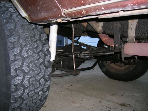 1978 Ford F-250 - Close-up view of the rear suspension and tire of a 1978 Ford F-250.