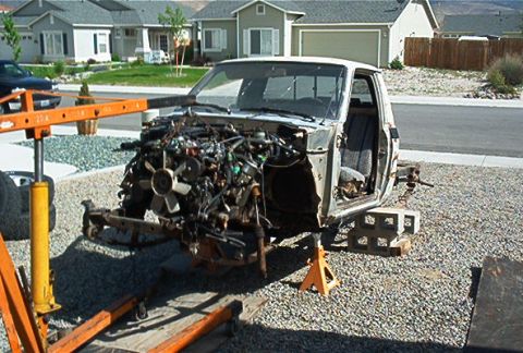 1982 Toyota 4Runner - The engine has been removed from this truck, which is supported by jack stands and an engine hoist.