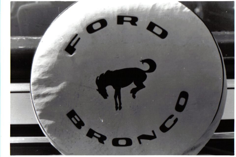 Spare tire cover with 'FORD BRONCO' text and a horse logo