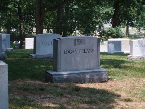 2004 Ford Crown Victoria - A cemetery scene with multiple tombstones, including one bearing the name LOGAN FELAND.