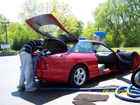 1996 Ford Probe - A red 1996 Ford Probe is being vacuumed out at a car wash on May 19, 2007.