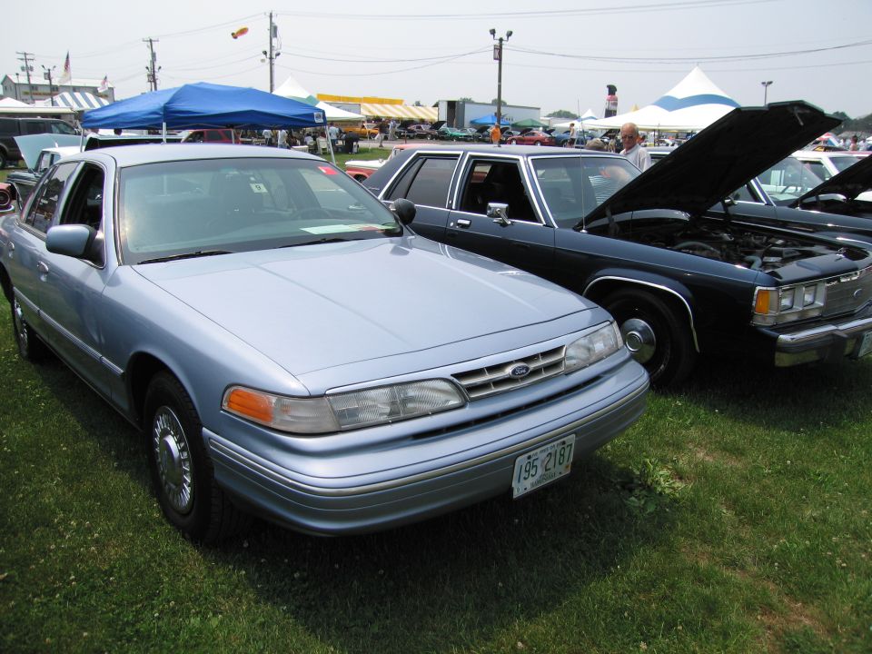 Light blue 1991 Ford Crown Victoria front 3/4 view with license plate 195 2187