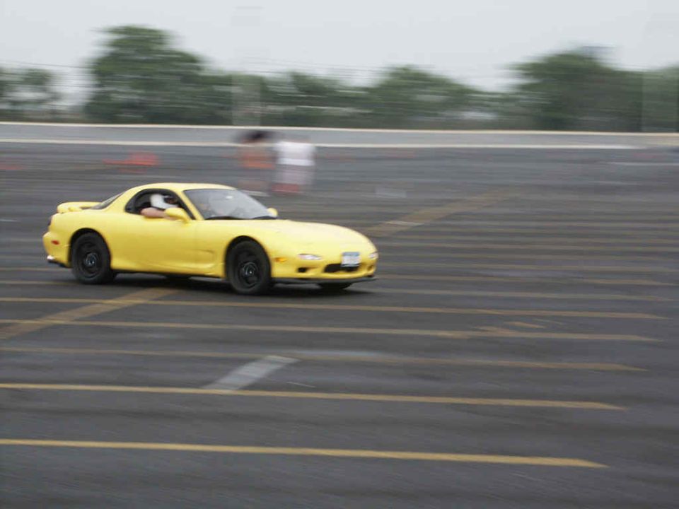 Yellow sports car on track