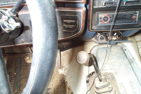 1988 Ford Bronco - The interior shows a manual transmission and 4x4 controls, suggesting an older truck or SUV.