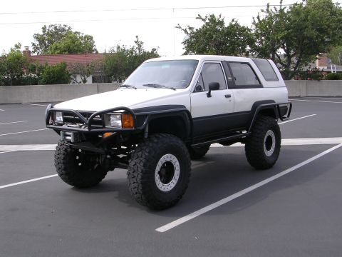 1985 Toyota 4Runner - This modified 1985 Toyota 4Runner features a custom front bumper and oversized tires for off-road capability.