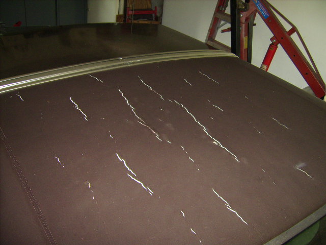 This is why the conversion is taking place - a cracked vinyl top.