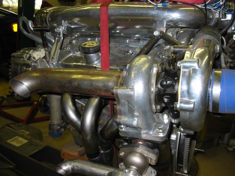 1993 Ford Taurus - Custom engine build twin turbochargers and polished components.