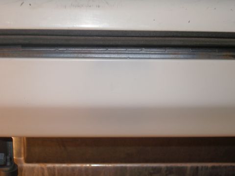1990 Ford Bronco - Sanded, primed, and painted. Its hard to find 1990 model ford faded white. I got an artic white from duplicolor. I dont like this because t…