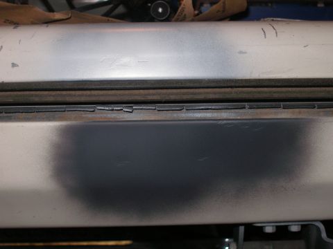 1990 Ford Bronco - In between stages here. Some bondo not done well, primered and painting in process.
