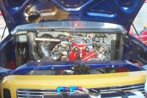 1994 Ford F-150 - Custom engine modifications are visible in the engine bay, a prominent turbocharger and intricate plumbing.