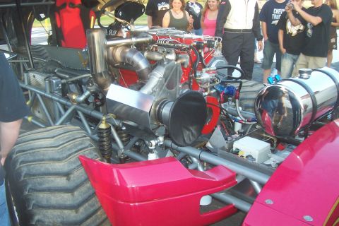 1994 Ford F-150 - A powerful engine with large turbochargers and exhaust systems is the focus of this drag racing truck.