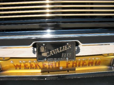 1978 Ford E250 - Custom painted bumper reads "WEEKEND FRIEND" below a "CAVALIER VANS" license plate.