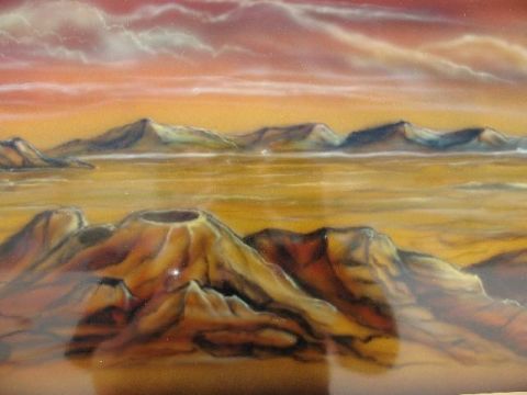 1978 Ford E250 - This photo shows an airbrushed desert landscape with mountains and a volcano under an orange sky.