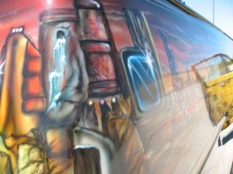 1978 Ford E250 - A custom airbrushed mural depicts a surreal cityscape with waterfalls and glowing windows on the side of a vehicle.