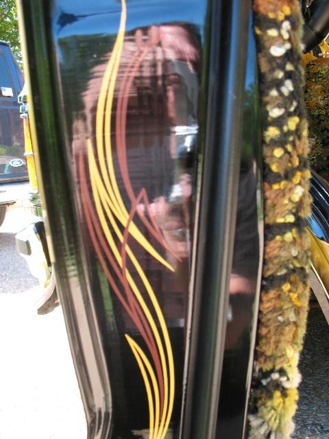 1978 Ford E250 - Close-up of a 1978 Ford E250 door custom pinstriping and fuzzy trim.
