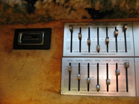 1978 Ford E250 - Interior view of a vehicle's audio controls, showing a graphic equalizer and antenna booster.