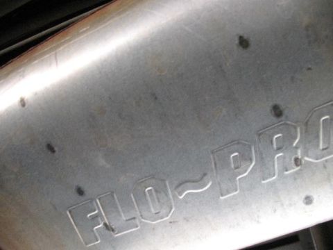 1978 Ford E250 - The FLO-PRO logo is embossed on the side of this vehicle's exhaust muffler.