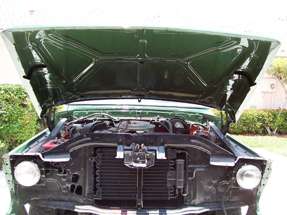 1978 Ford Bronco engine bay with hood open, showing engine and radiator