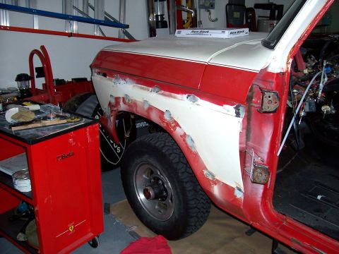 1978 Ford Bronco - Bodywork in progress on a 1978 Ford Bronco, focusing on the front fender area.