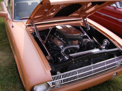 1970 Ford Ranchero - Engine bay of a 1970 Ford Ranchero, a V8 engine and custom chrome components.