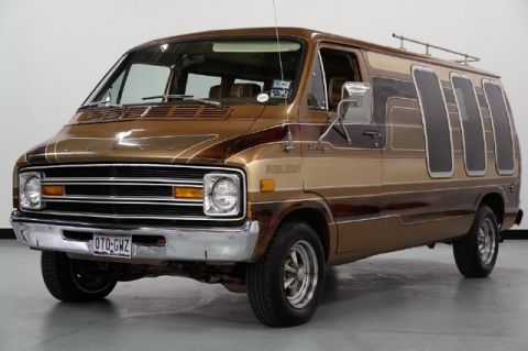 1978 Ford E250 - This Dodge van features a distinctive two-tone brown paint scheme with custom window panels and a roof rack.