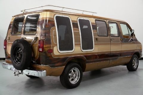 1978 Ford E250 - A full-size cargo/conversion van shown from the rear three-quarter angle, finished in a custom brown and tan flame/marble paint scheme with…