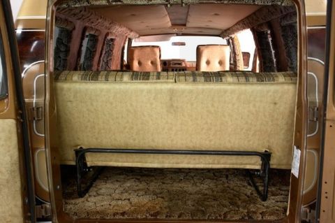 1978 Ford E250 - Custom interior of a 1978 Ford E250 van features plush tan upholstery and shag carpeting.