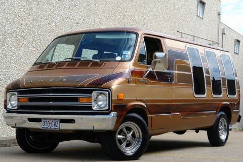 1978 Ford E250 - This van, likely a 1977 model, features a distinctive two-tone paint job and custom window modifications.