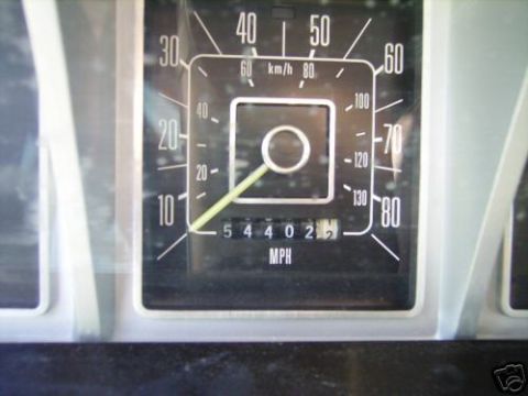 1978 Ford E250 - The speedometer gauge displays the vehicle's speed and mileage, indicating it is a 1978 Ford E250.