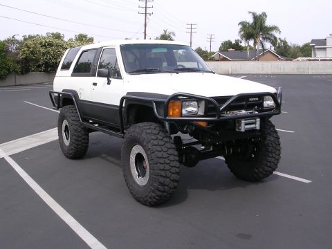 1985 Toyota 4Runner - Modified 1985 Toyota 4Runner equipped for off-road use with aftermarket protection and tires.