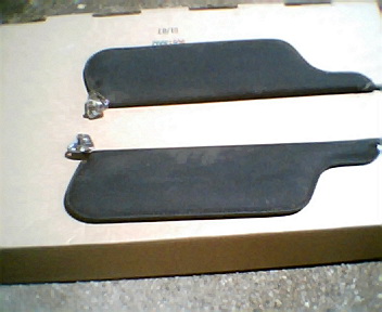 1973 Ford Ranchero - Pair of sun visors for a vehicle, possibly for a 1973 Ford Ranchero.