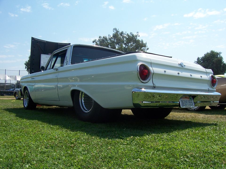 White 1960 Ford Falcon Ranchero rear view with hood open
