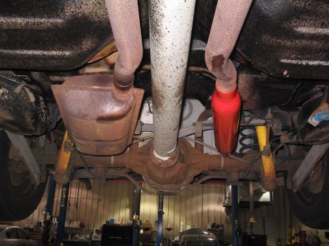 2001 Ford Crown Victoria - Halfway there, test fitting 25" long 2" Thrush glasspacks.