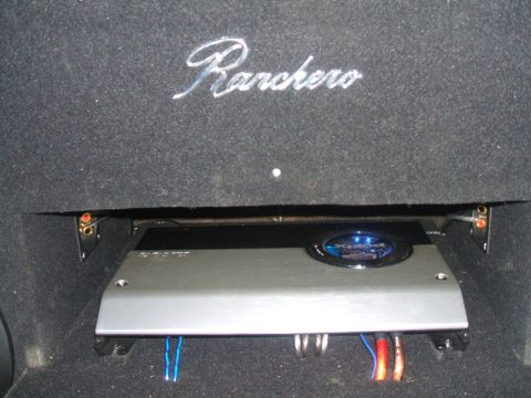 1974 Ford Ranchero - Interior view of a car's audio system, showing an amplifier and trim with the name 'Ranchero'.