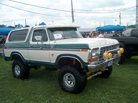 1978 Ford Bronco - Lifted 1978 Ford Bronco with custom paint and smiley face lights on the bumper.