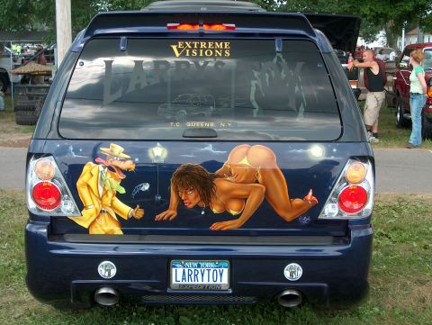 1978 Ford Bronco - This SUV features custom airbrushed artwork on its rear, including cartoon characters and a New York license plate.
