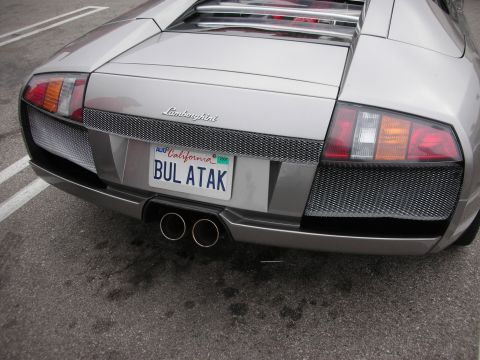 1998 Ford Crown Victoria - Silver Lamborghini's rear end features a custom California license plate and dual exhaust.