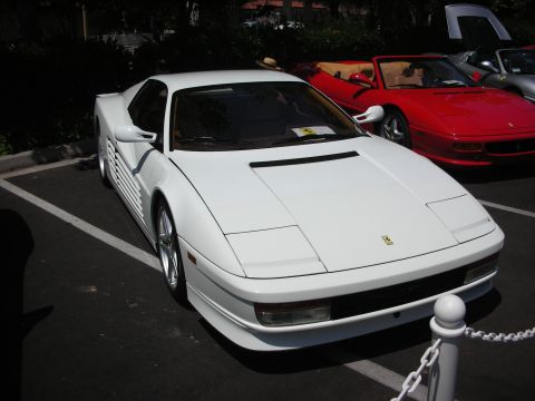 1998 Ford Crown Victoria - White Ferrari Testarossa with a red convertible and silver car in the background.