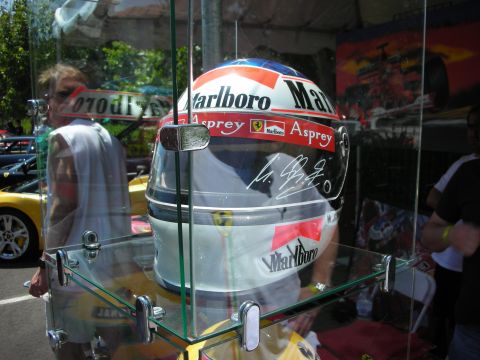 1998 Ford Crown Victoria - A Marlboro racing helmet, signed by a driver, is displayed in a glass case.