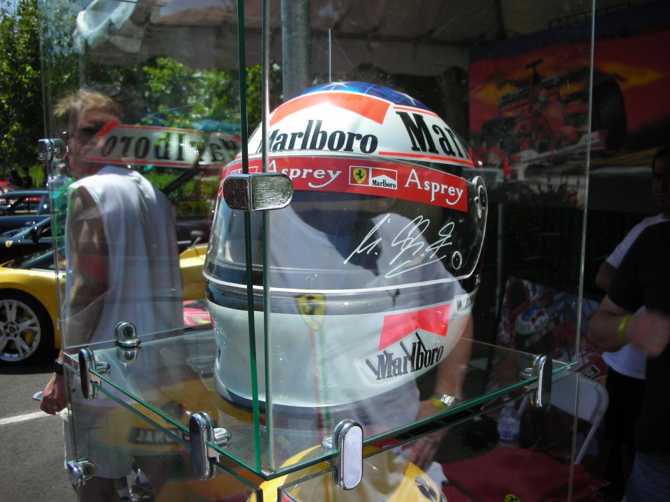 Marlboro racing helmet with signature and Ferrari logos