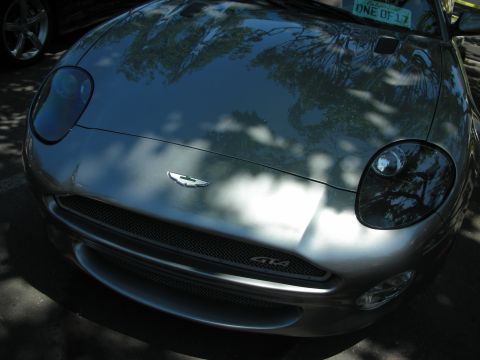 1998 Ford Crown Victoria - The front grille of an Aston Martin DB7 GT shows the 'GT4' designation.