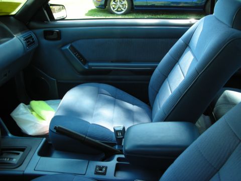 1998 Ford Crown Victoria - Interior view of a blue car, with another blue car visible outside.