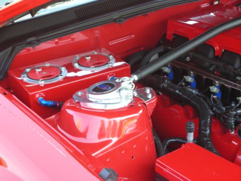 1998 Ford Crown Victoria - Custom engine bay features bright red paint, dual fuel tanks, and polished chrome components.
