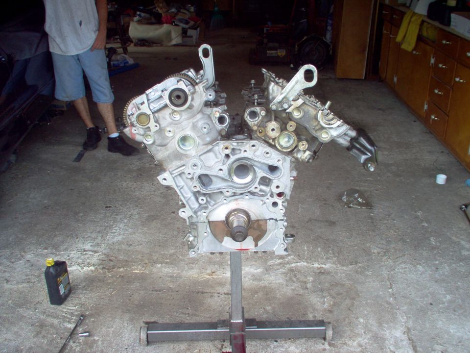 Engine on stand, V-configuration, with visible timing components