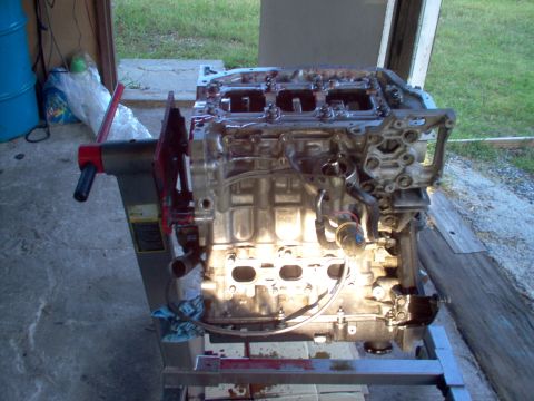 1996 Ford Probe - Engine block on an engine stand, likely undergoing repair or modification.