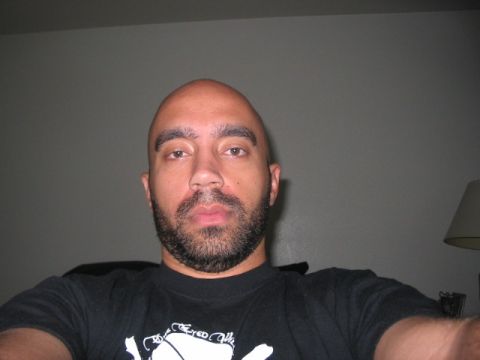 1991 Ford Bronco - A man with a beard and bald head is pictured in this selfie.