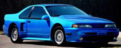 1987 Ford Thunderbird - This modified 1987 Ford Thunderbird features a custom body kit and a vibrant blue finish.