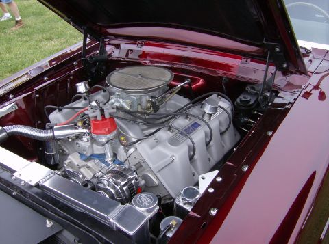 1970 Ford Ranchero - Custom V8 engine in a car's engine bay, aftermarket parts and a polished finish.