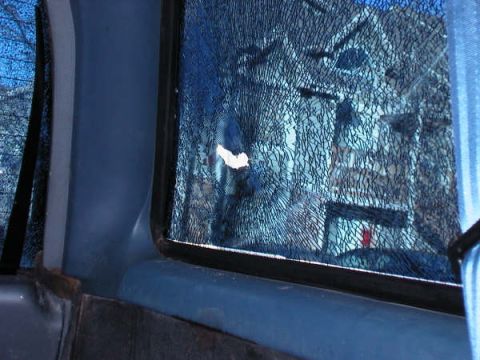 1994 Ford Bronco - Interior view of a vehicle showing a heavily cracked rear window.