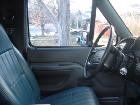 1994 Ford Bronco - Blue door panel painted grey before interior swap